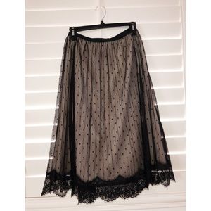Brown skirt with black polka dot lace